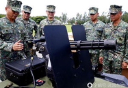 向菲免费提供武器,深化合作，共筑地区安全防线”